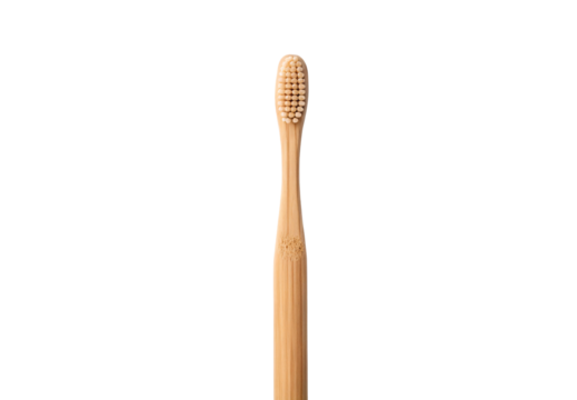 Bamboo toothbrush head close-up showing natural bristles detail, isolated on a transparent background