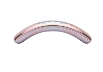 Rose gold facial massage tool isolated on transparent background for beauty and skincare