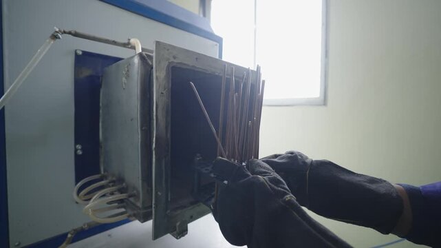 Taking out parts from Machine industrial