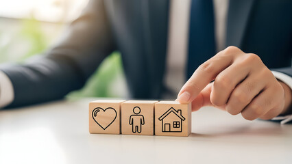 Protecting life family and home insurance concept with wooden blocks