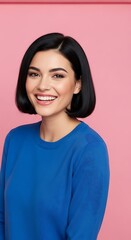 Fototapeta premium Portrait of a Smiling Woman with Short Dark Hair Against Pink Backdrop.