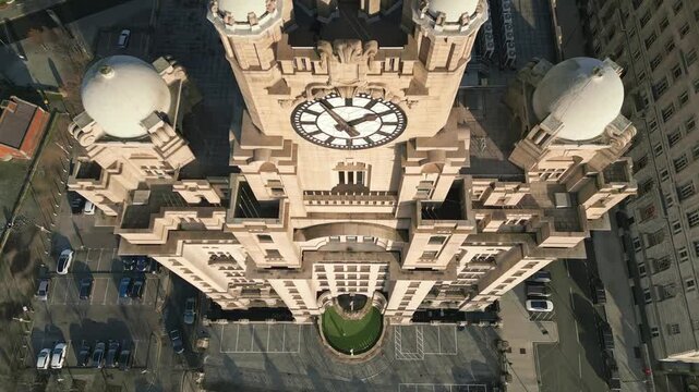 Aerial view looking down on Liver Building clock, Liverpool, Merseyside, England