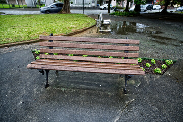 Classic and retro wooden benches in the city