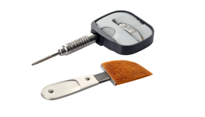 Precision tools, metal and brush, on black background