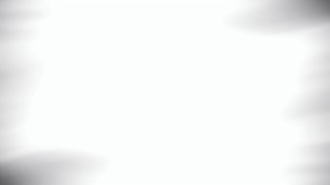 Abstract white background with blurred edges and soft gradients.