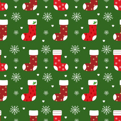 seamless pattern featuring a festive Christmas theme.The background is a solid deep green color, against which are repeating motifs of red Christmas stockings and white snowflakes.