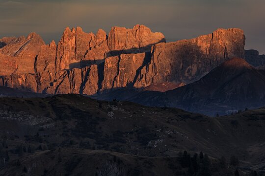 Steep mountains, mountain range, sunset, cloudy, autumn, Pordoi Pass, view of Croda da Lago, Dolomites, Italy