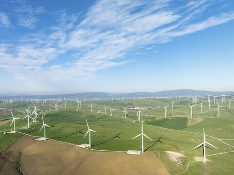 Windmills on a wind farm near Zahara de los Atunes. Aerial view. Drone shot. Cádiz province, Andalusia, Spain