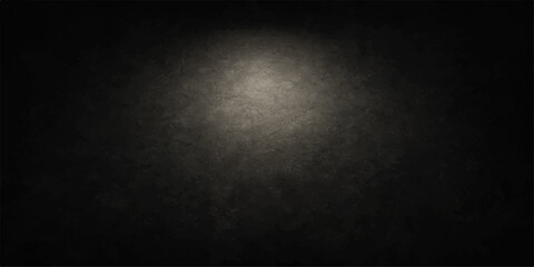 Dark old textured grunge wall surface with a spotlight, perfect for vintage black concrete paper pattern design wallpaper backdrop