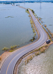 road with water on both sides