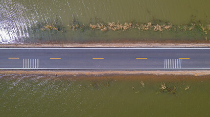 road with water on both sides