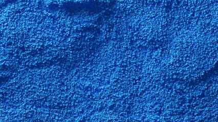 細かい粒子で構成された青い模様