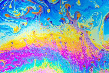 Psychedelic multicolored background abstract. Rainbow colors. patterns background. Photo macro shot of soap bubbles