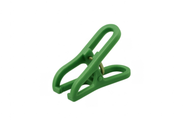 Green plastic clothespin clipping household laundry item