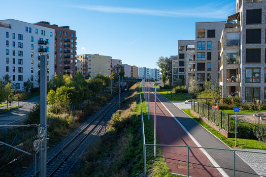 Wide angle contemporary architecture illustrating urban housing and sustainable development blended with green areas in the loren district of Oslo, Norway