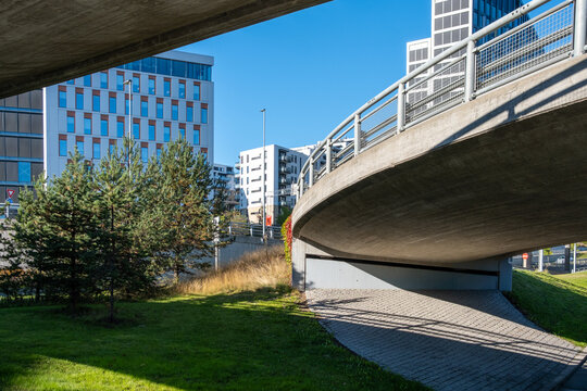 Wide angle architecture framing contemporary housing and urban development around green areas in the loren district of Oslo, Norway, highlighting design clarity