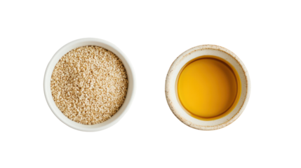Two oval white bowls with sesame seeds and egg yolk isolated on transparent background