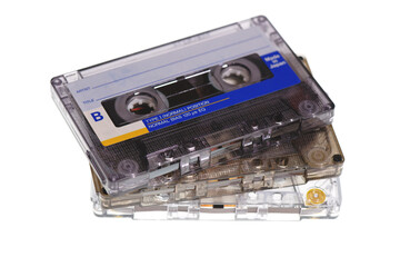 Stack of retro audio cassettes isolated on white background
