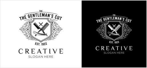 Vintage barbershop logo design featuring a shield with crossed razor and comb, elegant typography, and decorative flourishes on contrasting backgrounds.
