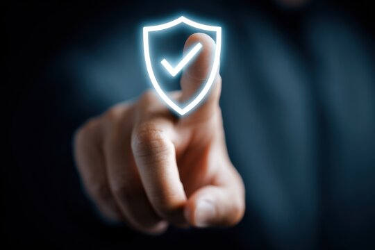 Password security icon with shield symbol and checkmark being selected by a person's finger in a digital setting focused on online safety and privacy