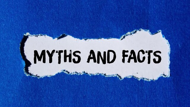 Myths and facts message writing on ripped torn paper background