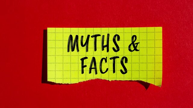 Myths and facts message writing on ripped torn paper background
