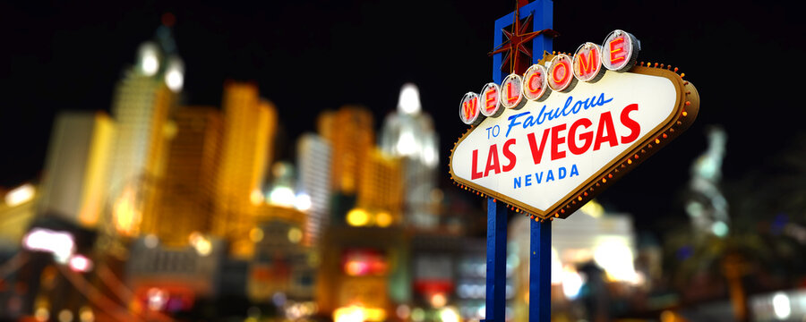 Welcome to Fabulous Las Vegas Sign at Night With Blurred Hotels in the Background. Logo Removed from the Sign