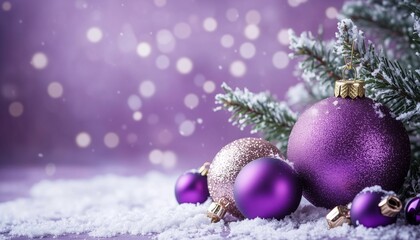 Colorful Purple Ornaments on Snow With a Blurred Festive Background During the Holiday Season