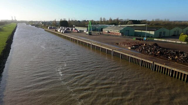 aerial view of scrap metal refuse at a port ready for export, heavy crane loading area, waste management, Sutton Bridge UK