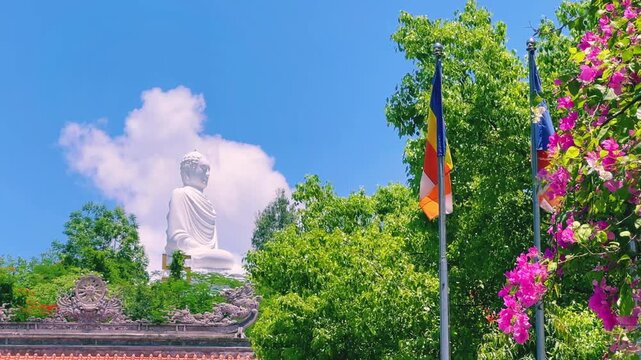 Nha Trang, Vietnam - September 18, 2025. Chua Long Son Pagoda with a large white Buddha statue in the vast, clear blue sky. The main Buddhist temple of Kien Giang Province. 4К	