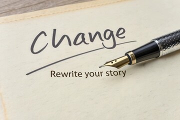 A pen writing Change symbolizing new beginnings for your story