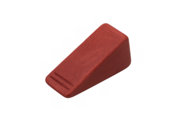 Red wooden door wedge stopping open a door