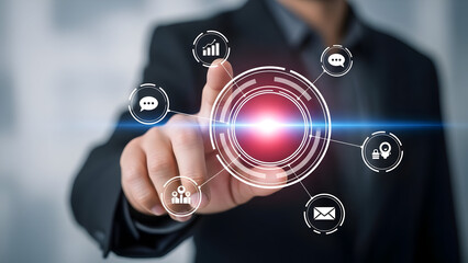 Businessman interacting with a futuristic digital interface and icons