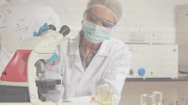 Researcher adjusting scope picking tube dipping rack inspecting sample with math overlaying scene - Powered by Adobe