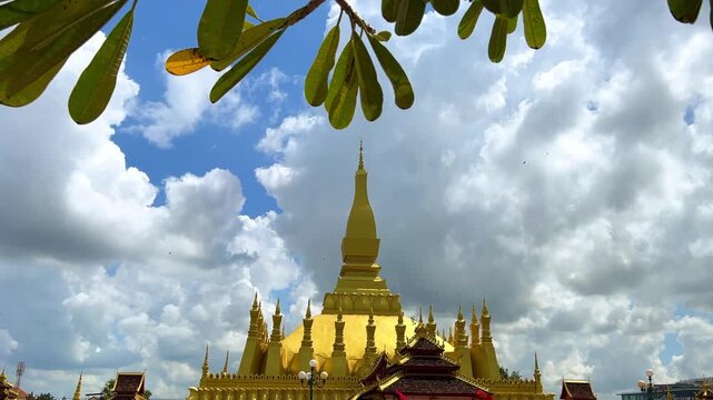 Pha That Luang Stupa is a famous landmark in Vientiane, Laos. Asia. Golden Stupa. Buddhist religious structure. Residence of the Lao Buddhist Patriarch. 4K	