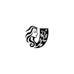 An elegant woman head letter logo featuring flowing hair and leaf elements shaped into an alphabet form, blending beauty and nature in a clean, modern style for branding.