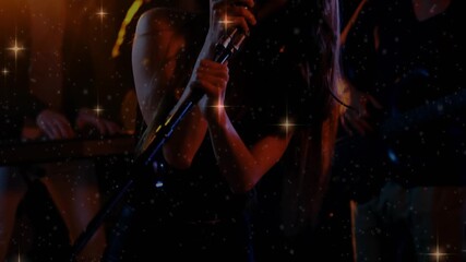 Lead female vocalist rising as camera tilts, with retro mic, singing music, band behind, sparkles - Powered by Adobe