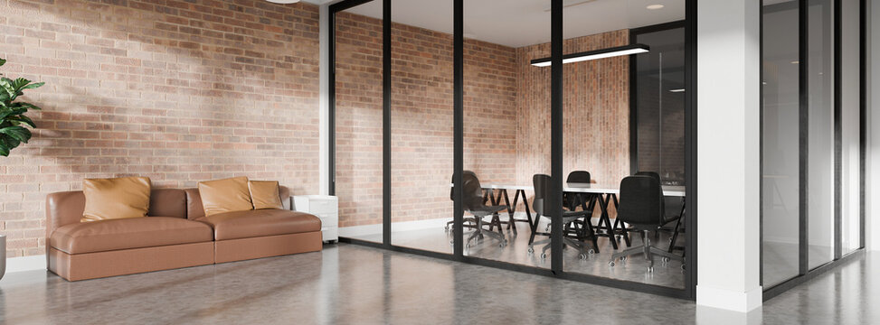 3D Modern industrial office interior with brick walls, glass meeting room, and a cozy seating corner in a contemporary workspace