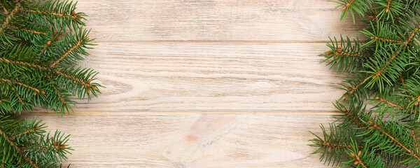 Christmas gray wooden background with fir tree and copy space. top view empty space for your design