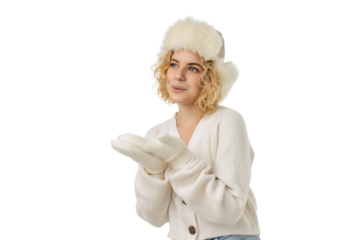 Woman wearing warm gloves and hat awaits New Year cheer, isolated, PNG