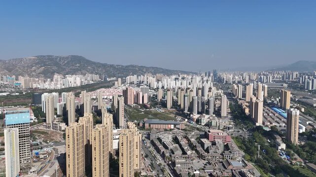 Lanzhou City Aerial View with Tall Buildings and Mountains, Gansu Province China