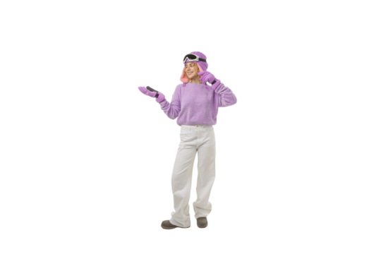 A young adult excitedly shares winter joy in ski attire, isolated, PNG