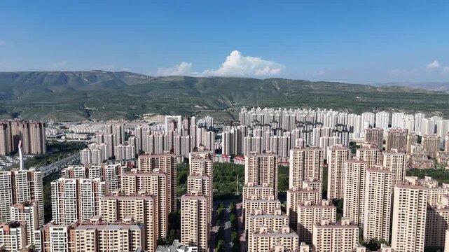 Aerial View of Xining City, Qinghai Province China with Mountains