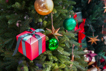 The red box gift with Christmas Tree.