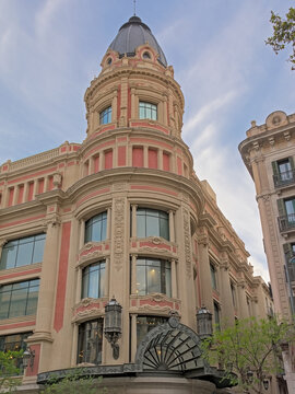  Round tower of a historical building in neoclassical style in Barcelona, Spain 