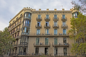Facade of an ornate neoclassical apartment building in Barcelona, Catalonia, Spain 