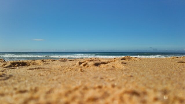 Low Angle Drone View of Santa Cruz Beach Looking Toward the Ocean in Portugal