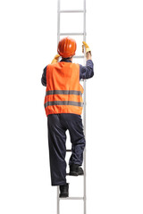 Rear view shot of a worker in a reflective vest and helmet climbing a ladder