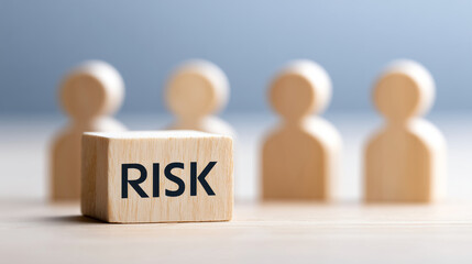 Wooden blocks with word risk on desk, concept of business strategy and decision making, ideal for financial planning, consulting presentations and risk management materials