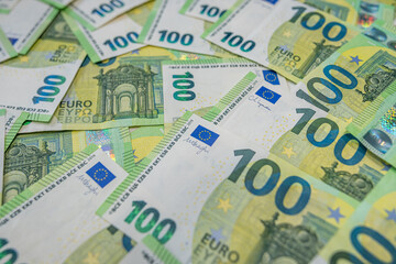 100 Hundred euro banknotes background symbol of wealth and economy